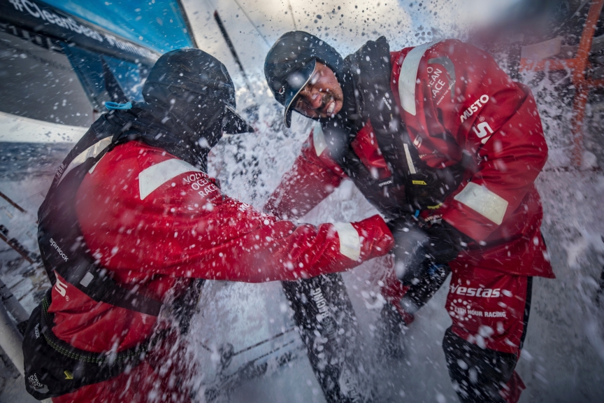 Leg 7 from Auckland to Itajai, day 06 on board Vestas 11th Hour. 23 March, 2018. Mark Towill feeling the cold water hitting him while grinding.